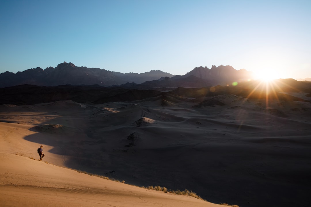 our-story Mesmerizing red sand dunes and endless mountain valleys providing iconic views across NEOM | NEOM, Saudi Arabia